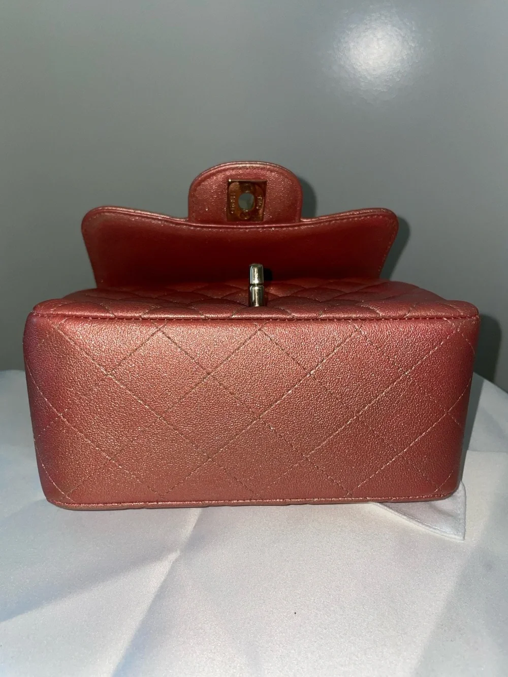 CHANEL Quilted Mini Flap Bag in Metallic Rose